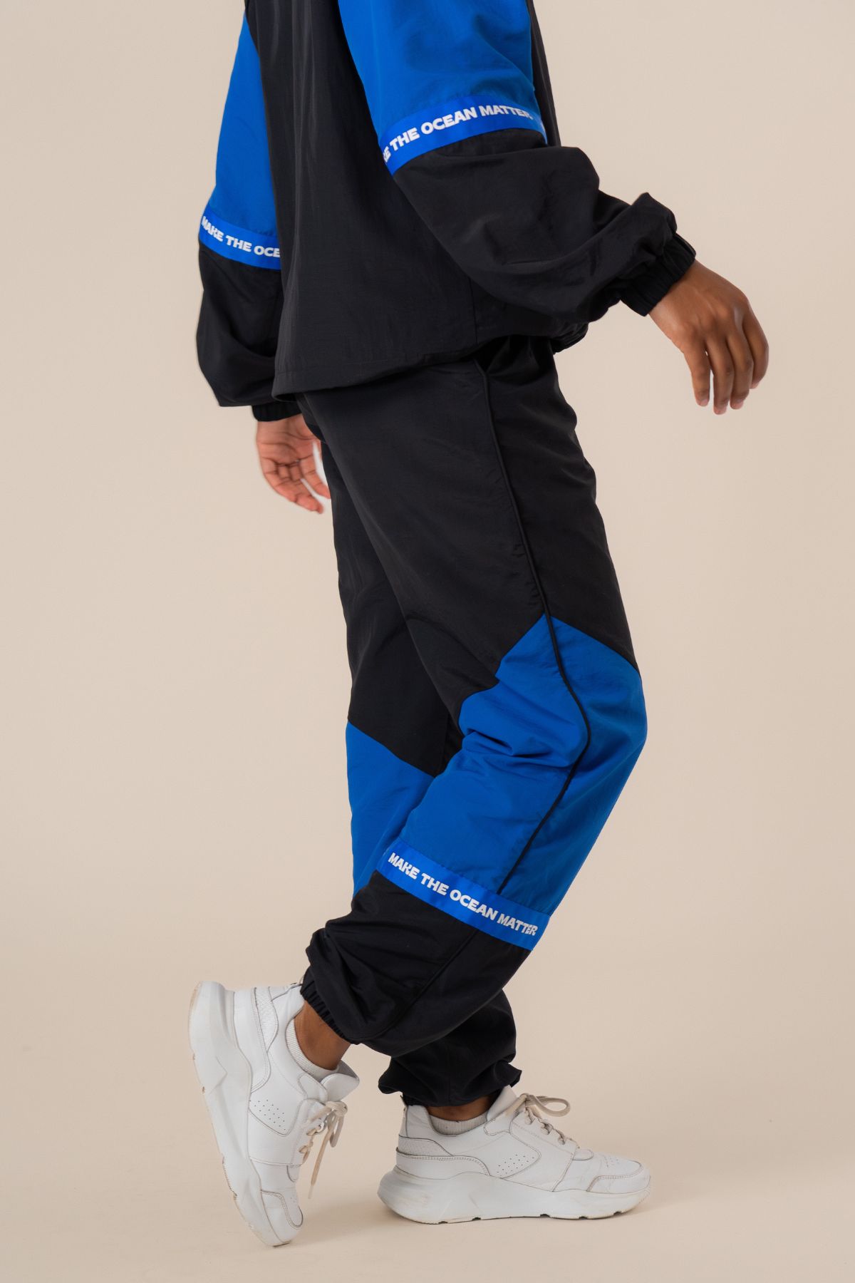 Adventure tracksuit pants - Nero/Cartel Blue